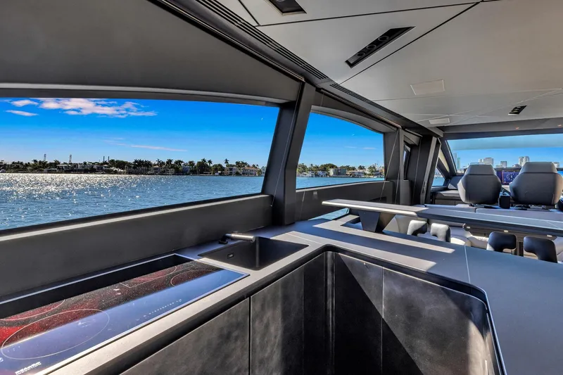  Yacht Photos Pics Interior view of 2025 Pershing GTX 80 yacht, showcasing sleek design and panoramic windows.