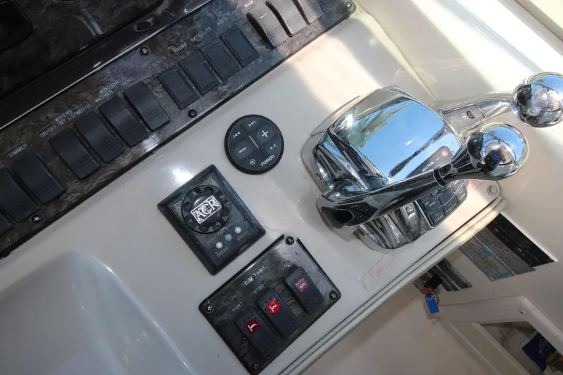 Rowdy Rio Yacht Photos Pics Control panel of 2008 Sea Ray 44 Sundancer yacht with chrome throttle levers.