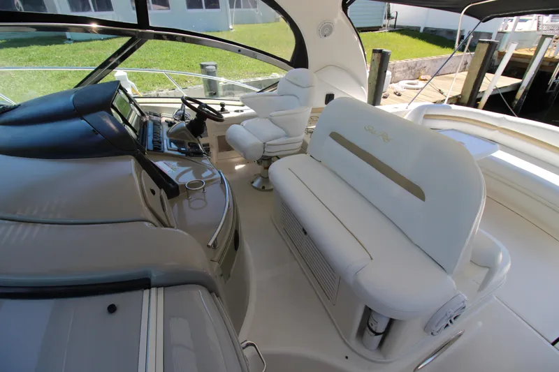 Rowdy Rio Yacht Photos Pics 2008 Sea Ray 44 Sundancer yacht interior with plush seating and modern helm controls.