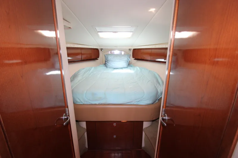 Rowdy Rio Yacht Photos Pics Luxurious cabin interior of 2008 Sea Ray 44 Sundancer yacht with cozy bed.