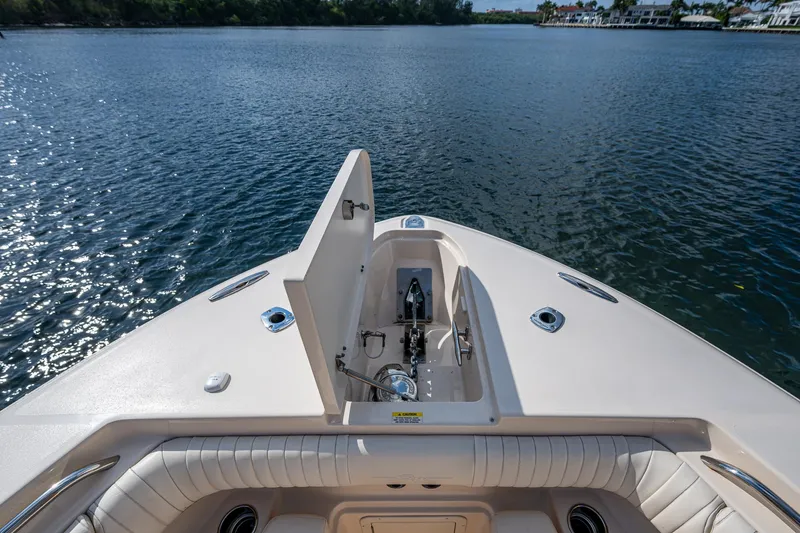  Yacht Photos Pics Bow view of 2012 Grady-White 336 boat on calm water.
