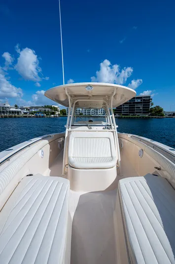  Yacht Photos Pics 2012 Grady-White 336 boat on water, clear sky, modern design.