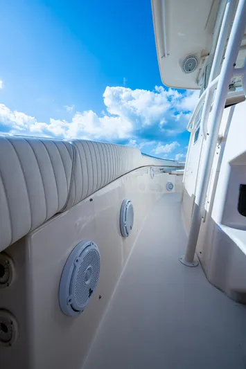  Yacht Photos Pics 2012 Grady-White 336 boat deck with blue sky and clouds.