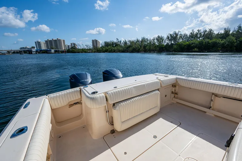  Yacht Photos Pics 2012 Grady-White 336 boat deck with scenic waterfront view.