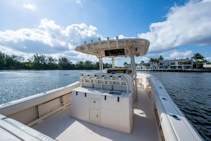  Yacht Photos Pics 2012 Grady-White 336 boat on calm water under a blue sky.
