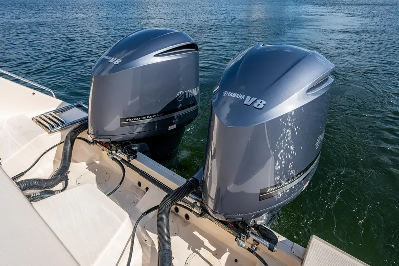  Yacht Photos Pics Twin Yamaha V8 outboard engines on a 2012 Grady-White 336 boat in water.