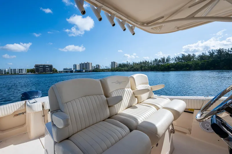  Yacht Photos Pics Luxury seating on 2012 Grady-White 336 boat with scenic waterfront view.