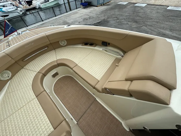  Yacht Photos Pics 2021 Chris-Craft Launch 31 GT boat interior with luxurious tan seating and diamond-stitched upholstery.