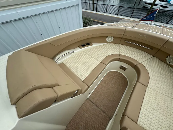  Yacht Photos Pics 2021 Chris-Craft Launch 31 GT boat with beige leather seating and woven flooring.