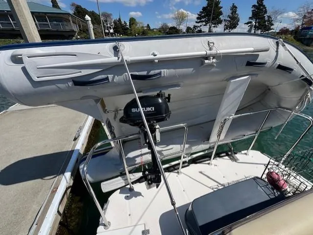 Yellow Jacket Yacht Photos Pics 2020 Ranger Tugs R-31 CB with Suzuki outboard motor, docked at marina.