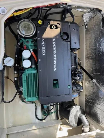 Yellow Jacket Yacht Photos Pics Volvo Penta engine in 2020 Ranger Tugs R-31 CB boat, showcasing mechanical components.