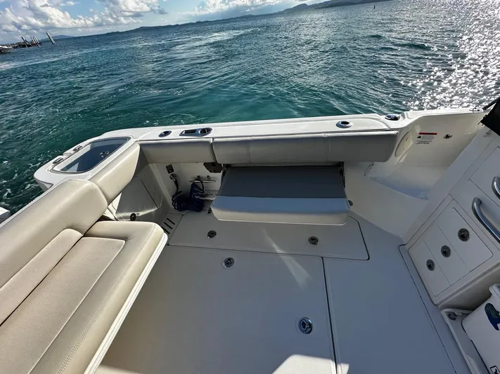  Yacht Photos Pics Boston Whaler 345 Conquest 2022 boat interior with ocean view.