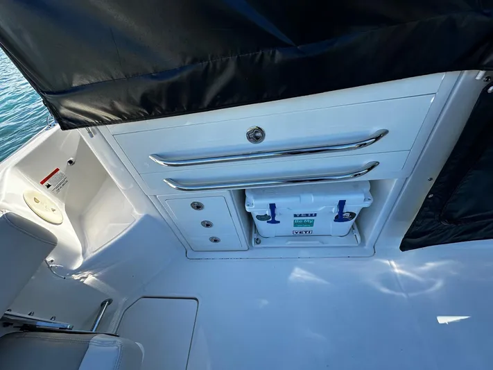  Yacht Photos Pics 2022 Boston Whaler 345 Conquest interior with storage and cooler.