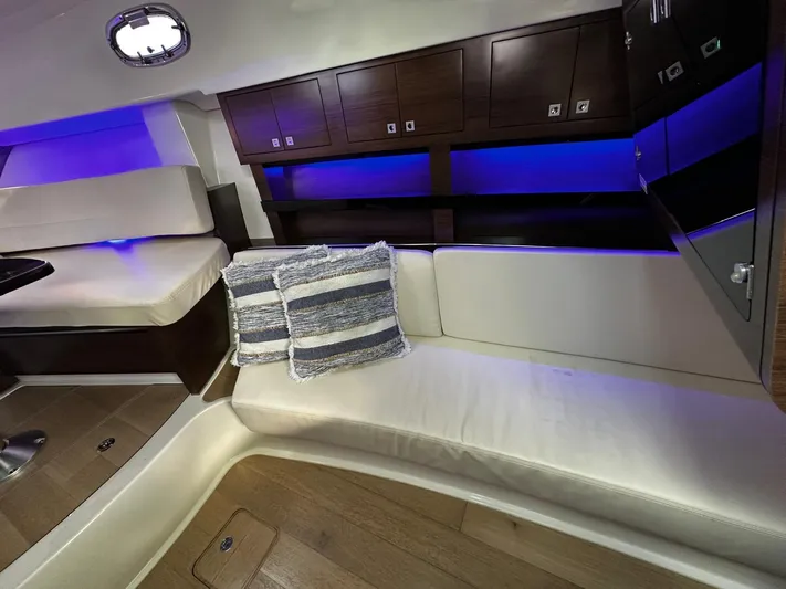  Yacht Photos Pics Luxurious interior of 2022 Boston Whaler 345 Conquest with ambient lighting and plush seating.