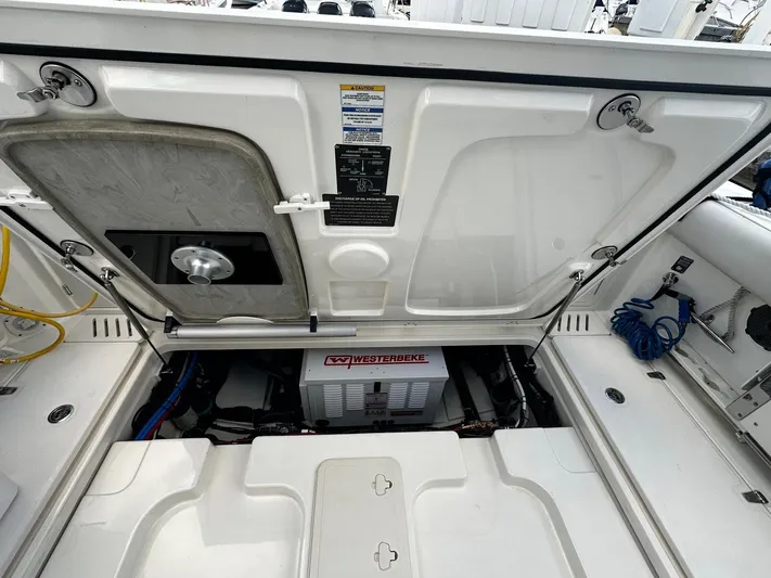  Yacht Photos Pics Boston Whaler 345 Conquest 2022 engine compartment with Westebeke generator.