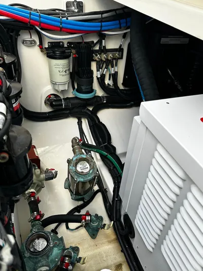  Yacht Photos Pics Engine compartment of a 2022 Boston Whaler 345 Conquest with visible wiring and components.