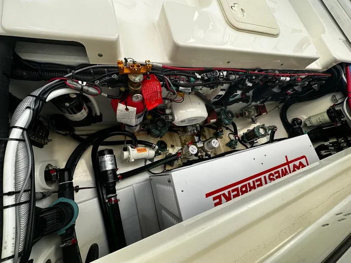  Yacht Photos Pics Engine compartment of 2022 Boston Whaler 345 Conquest, showcasing wiring and components.