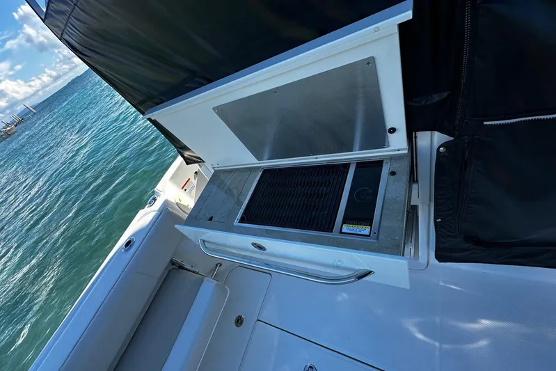  Yacht Photos Pics Boston Whaler 345 Conquest 2022 boat grill area with ocean view.
