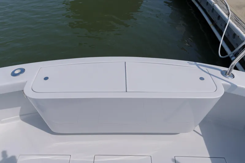 Enticer Yacht Photos Pics 1998 Gamefisherman Enticer boat deck, featuring a clean, white surface near the water.