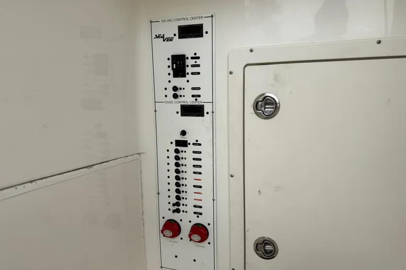  Yacht Photos Pics Control panel of 2020 SeaVee 290B boat, featuring 120VAC and 12VDC systems.