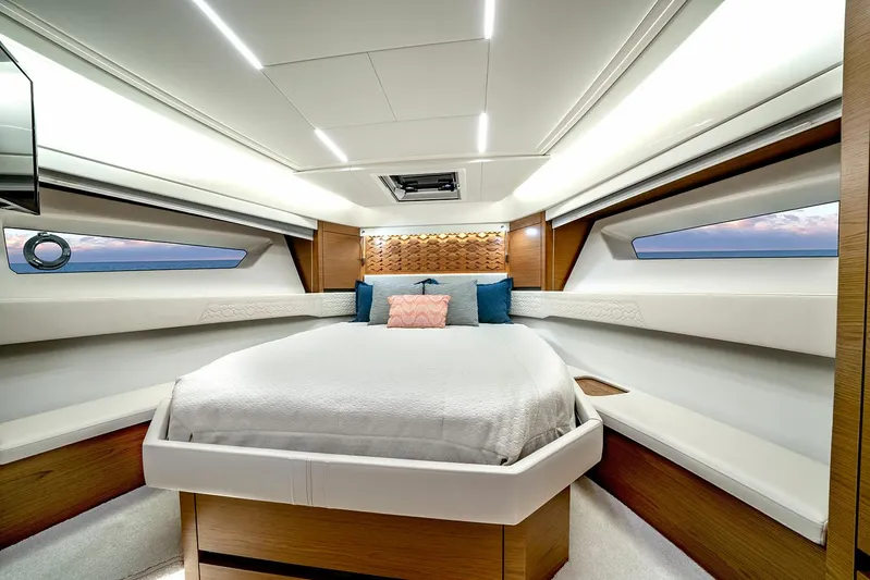  Yacht Photos Pics Manufacturer Provided Image: Luxurious 2025 Tiara Yachts 48 LE cabin interior with modern design and ambient lighting.