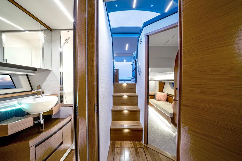  Yacht Photos Pics Manufacturer Provided Image: Luxurious interior of 2025 Tiara Yachts 48 LE, featuring modern design and elegant wood finishes.