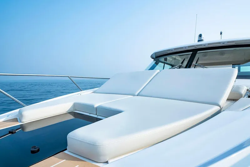  Yacht Photos Pics Manufacturer Provided Image: 2025 Tiara Yachts 48 LE luxury yacht with sleek deck and comfortable seating.