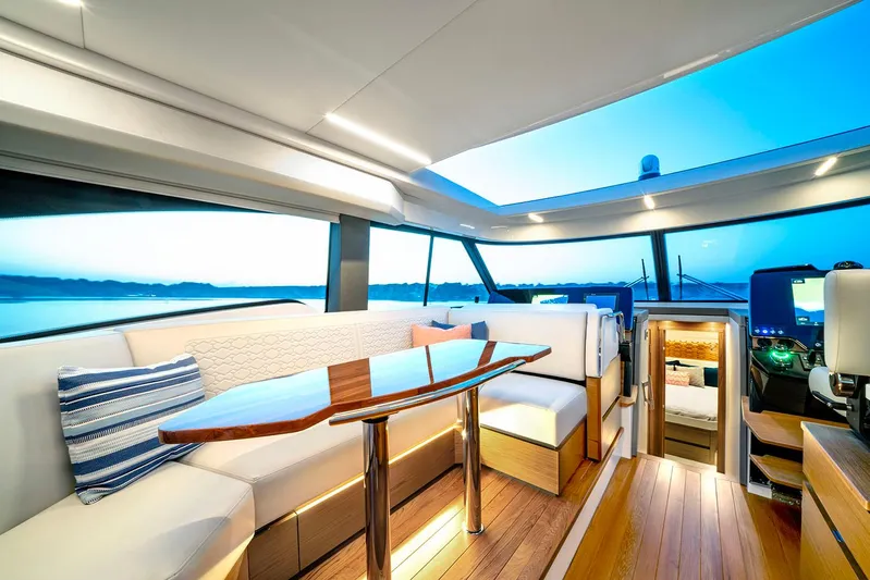  Yacht Photos Pics Manufacturer Provided Image: Luxurious interior of 2025 Tiara Yachts 48 LE with elegant seating and modern design.