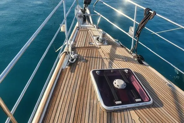  Yacht Photos Pics Deck of 2013 Jeanneau 57 yacht with teak finish and ocean view.