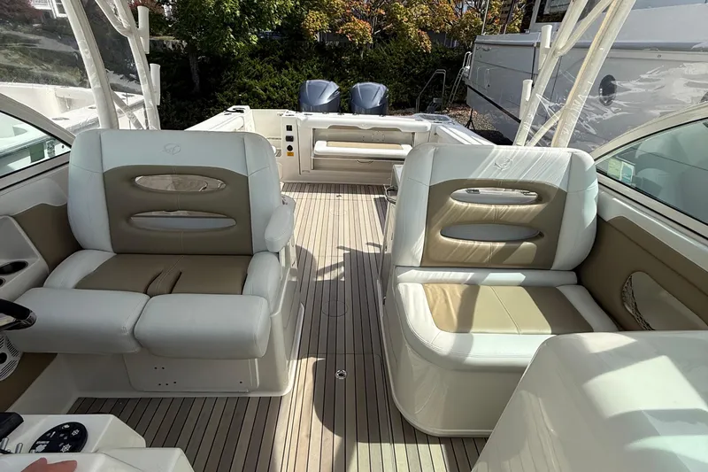  Yacht Photos Pics 2016 Sailfish 325 DC boat interior with beige and white seating, spacious deck.