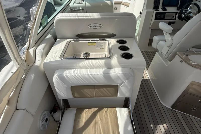  Yacht Photos Pics Interior of a 2016 Sailfish 325 DC boat featuring a sink and cup holders.