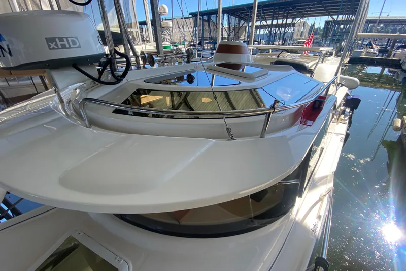  Yacht Photos Pics 2019 Ranger Tugs R-29 S boat docked in marina, showcasing sleek design and radar equipment.
