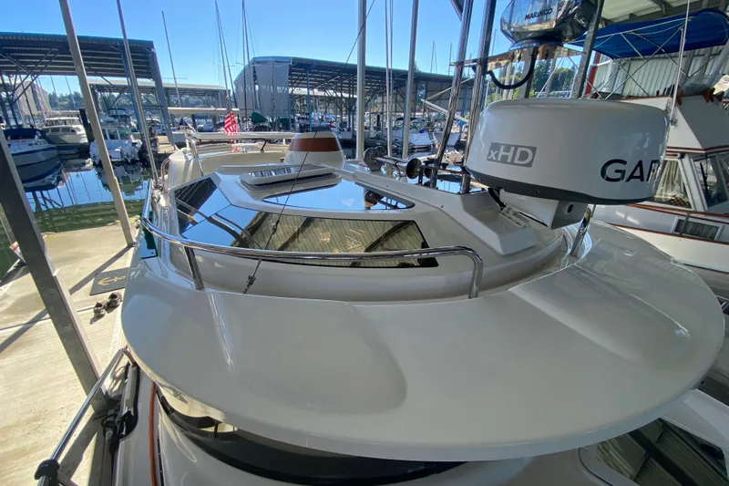  Yacht Photos Pics 2019 Ranger Tugs R-29 S boat docked in a marina, featuring Garmin xHD radar.