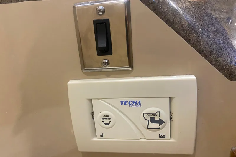  Yacht Photos Pics Control panel for Tecma Thetford toilet in 2019 Ranger Tugs R-29 S boat.