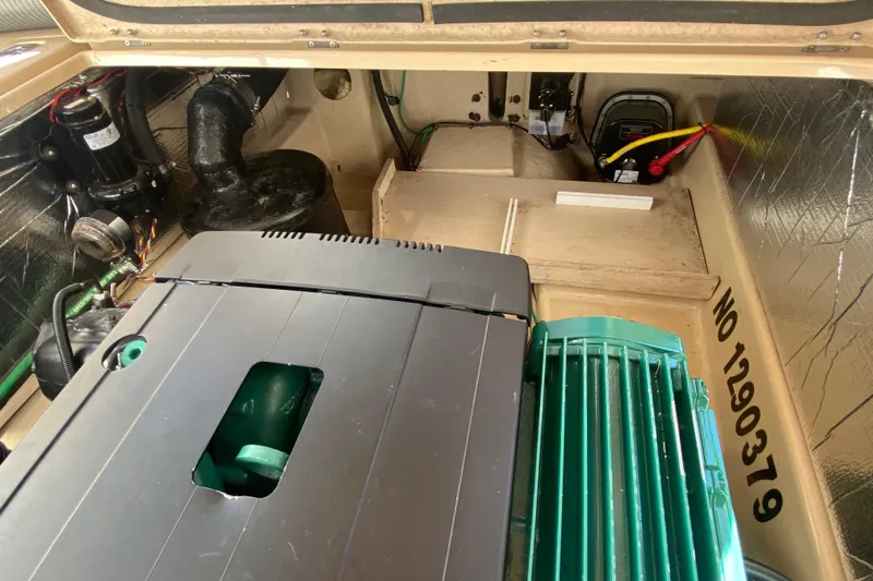  Yacht Photos Pics Engine compartment of 2019 Ranger Tugs R-29 S, showcasing mechanical components and wiring.