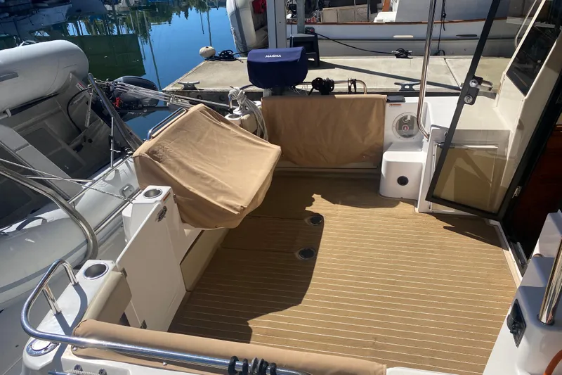  Yacht Photos Pics 2019 Ranger Tugs R-29 S boat deck with tan seating and striped flooring.