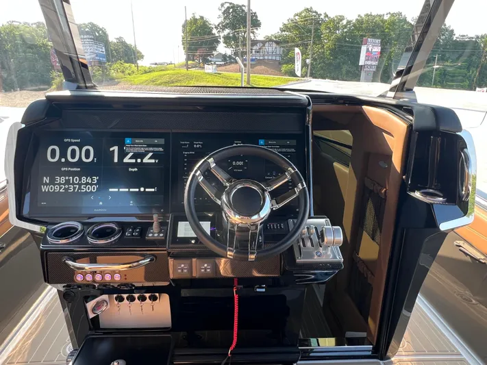  Yacht Photos Pics 2026 Nor-Tech 400 Supersport dashboard with advanced navigation and control systems.