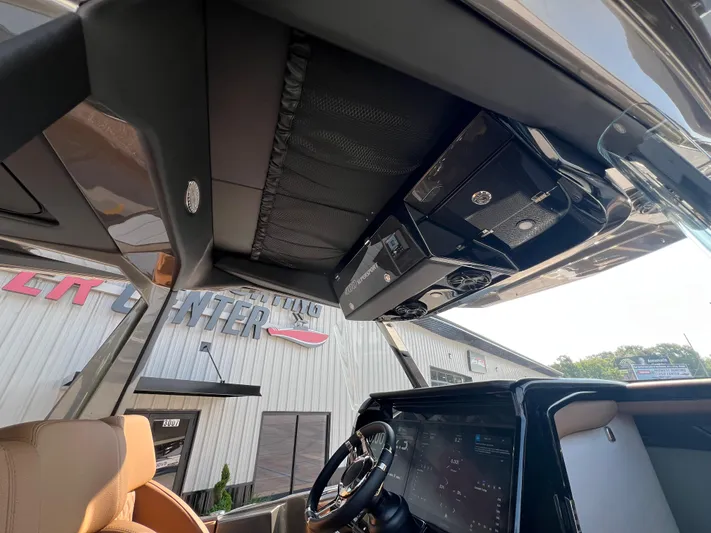  Yacht Photos Pics Interior view of 2026 Nor-Tech 400 Supersport boat, showcasing dashboard and overhead console.