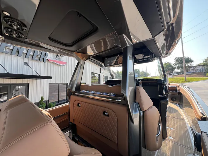  Yacht Photos Pics 2026 Nor-Tech 400 Supersport interior with luxurious seating and modern design features.