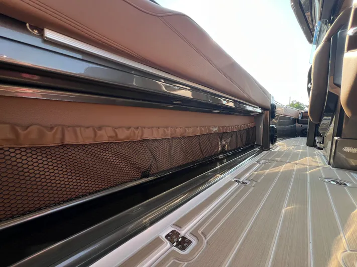  Yacht Photos Pics 2026 Nor-Tech 400 Supersport interior with brown seating and sleek flooring.