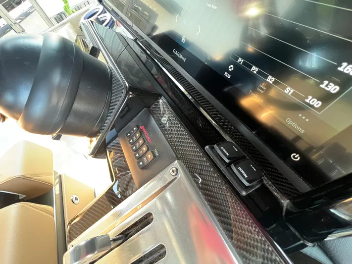  Yacht Photos Pics 2026 Nor-Tech 400 Supersport dashboard with Garmin display and Mercury controls.