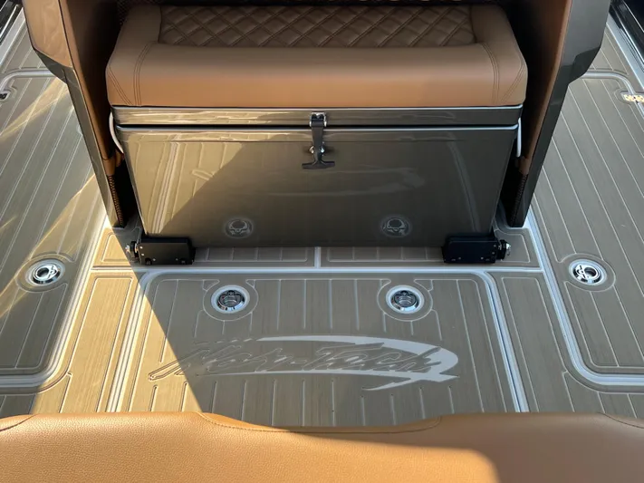  Yacht Photos Pics 2026 Nor-Tech 400 Supersport boat interior with tan seating and custom flooring.