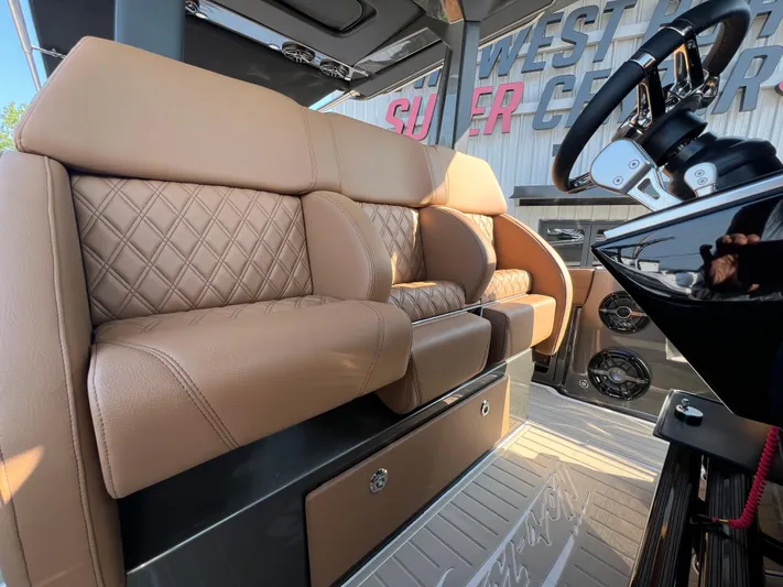  Yacht Photos Pics Luxurious interior of 2026 Nor-Tech 400 Supersport with tan leather seating and modern controls.