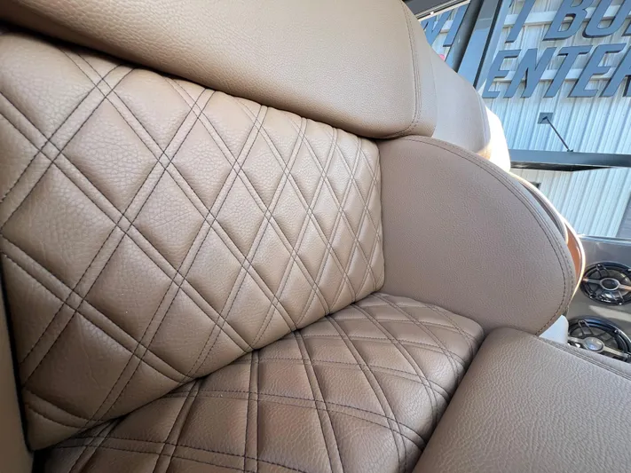  Yacht Photos Pics Luxurious leather seating in 2026 Nor-Tech 400 Supersport boat, featuring diamond stitching.