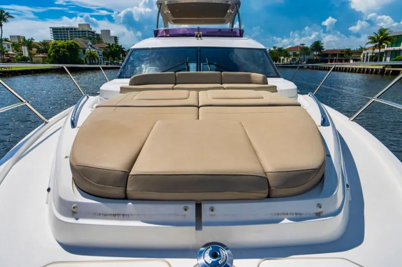 Endeavor Yacht Photos Pics Luxurious 2019 Princess F55 yacht with spacious sunbathing deck on a scenic waterway.