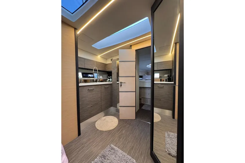 Dena Yacht Photos Pics Modern interior of 2021 Airon Cinquanta 50 yacht with sleek kitchen design.