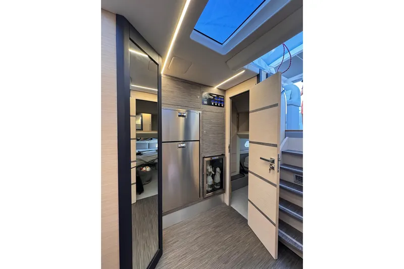 Dena Yacht Photos Pics Modern interior of 2021 Airon Cinquanta 50 yacht with sleek design and ambient lighting.