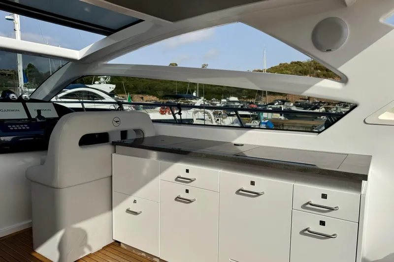 Dena Yacht Photos Pics Interior of 2021 Airon Cinquanta 50 yacht with sleek cabinetry and modern design.