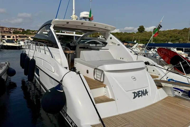 Dena Yacht Photos Pics Luxury Airon Cinquanta 50 yacht docked at marina, 2021 model, elegant design.