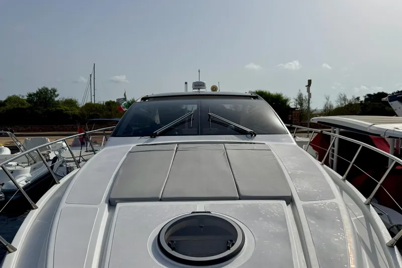 Dena Yacht Photos Pics 2021 Airon Cinquanta 50 yacht docked, showcasing sleek design and modern features.